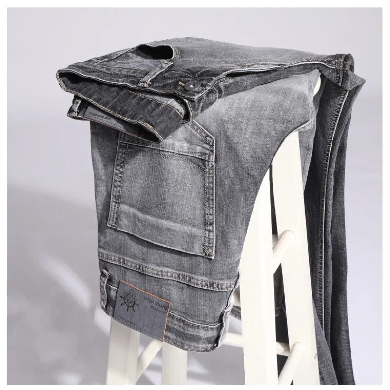 Pantalones vaqueros elásticos de algodón para hombre, Vaqueros de mezclilla finos informales de negocios, color gris, primavera y verano, nuevo ajuste recto y ligero