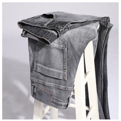 Pantalones vaqueros elásticos de algodón para hombre, Vaqueros de mezclilla finos informales de negocios, color gris, primavera y verano, nuevo ajuste recto y ligero