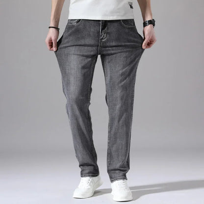 Pantalones vaqueros elásticos de algodón para hombre, Vaqueros de mezclilla finos informales de negocios, color gris, primavera y verano, nuevo ajuste recto y ligero