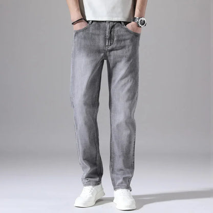 Pantalones vaqueros elásticos de algodón para hombre, Vaqueros de mezclilla finos informales de negocios, color gris, primavera y verano, nuevo ajuste recto y ligero
